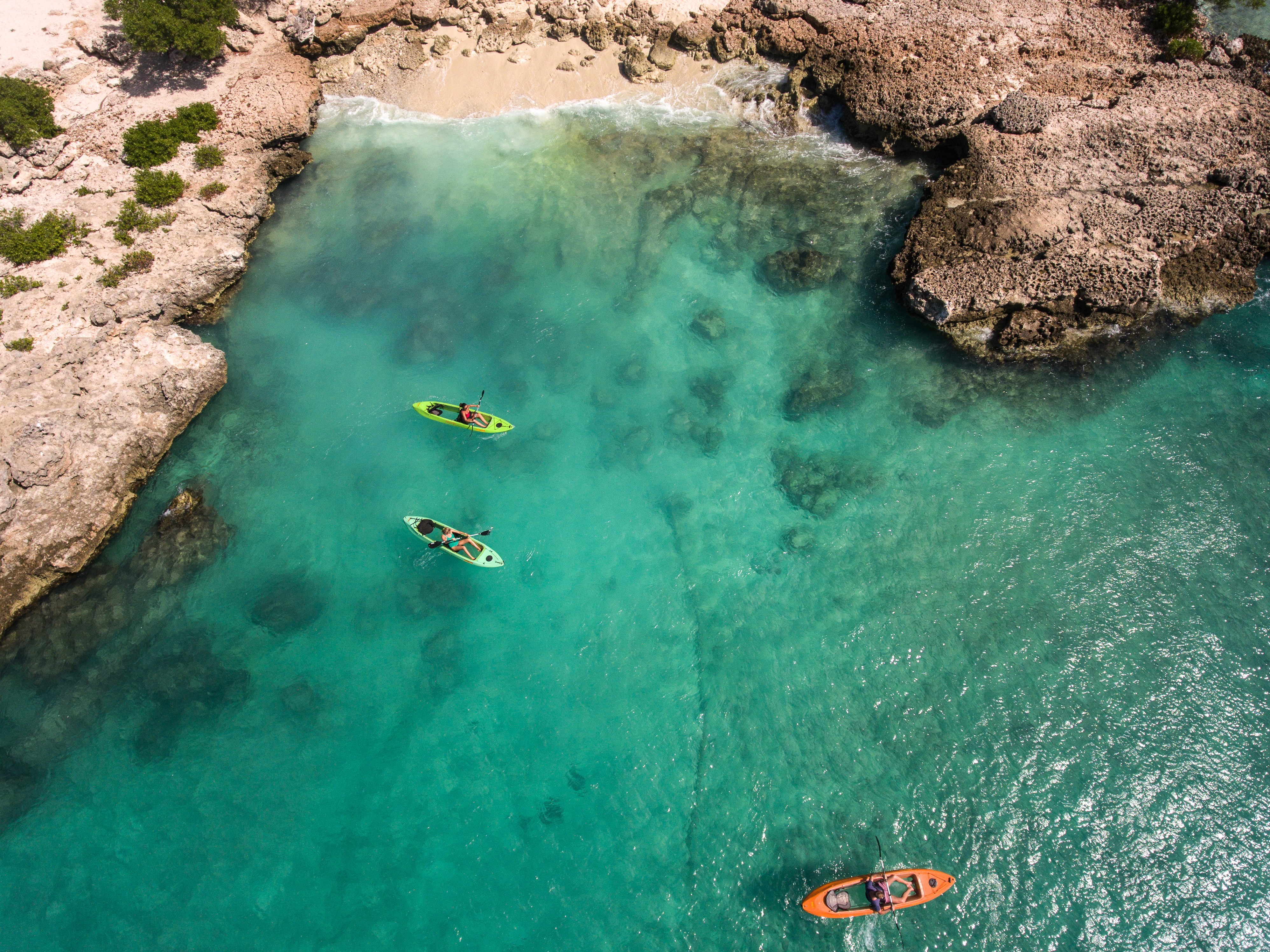Kayaks in clear Aruba water.